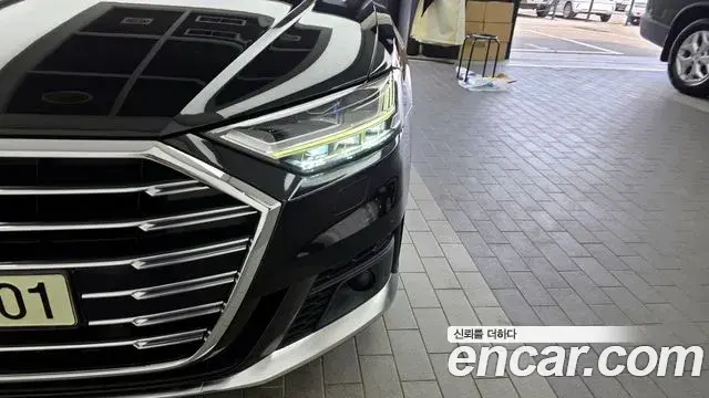 Audi A8 2021 — ფოტო 20/34