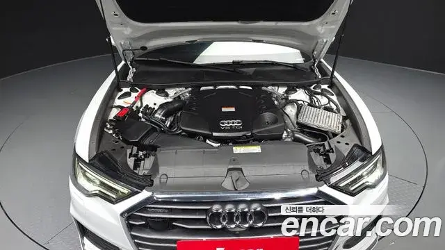 Audi A6 2021 — ფოტო 28/34