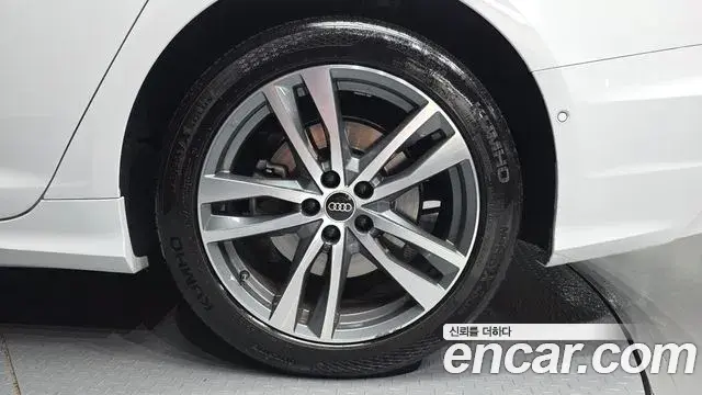 Audi A6 2021 — ფოტო 23/34