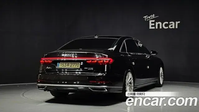Audi A8 2021 — Фото 2/20
