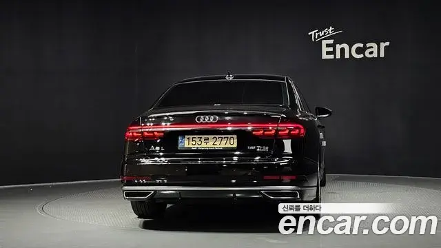 Audi A8 2021 — Фото 4/20