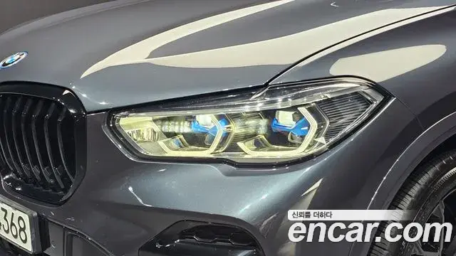 BMW X5 2022 — ფოტო 25/32