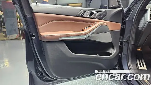 BMW X5 2022 — ფოტო 26/32