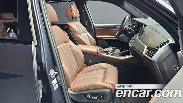 BMW X5 2022 — ფოტო 19/32