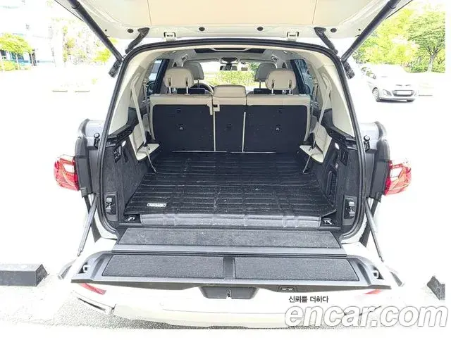 BMW X7 2021 — ფოტო 7/19