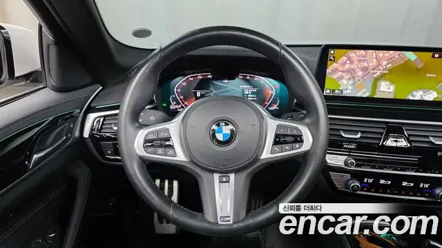 BMW 5 Series 2021 — ფოტო 28/32