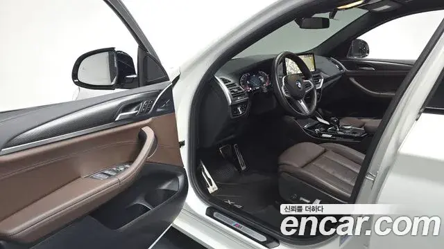 BMW X4 2023 — Фото 10/20