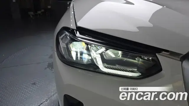 BMW X4 2023 — ფოტო 22/31