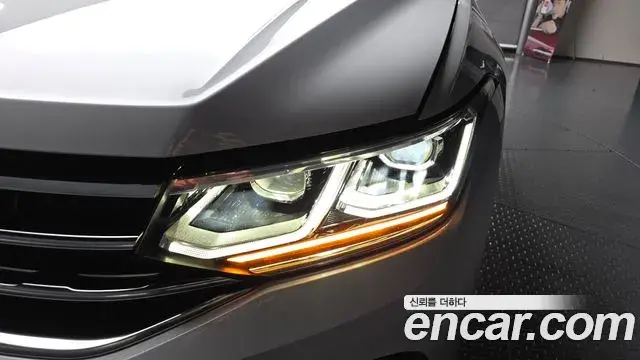 Volkswagen Tiguan 2021 — ფოტო 5/36