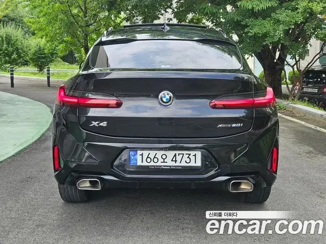 BMW X4 2024 — ფოტო 15/20