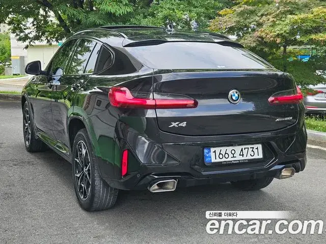 BMW X4 2024 — ფოტო 19/20