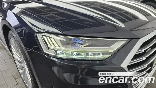 Audi A8 2021 — ფოტო 4/35