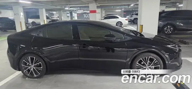 Toyota Prius 2024 — Şəkil 1/10