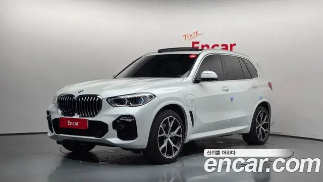 BMW X5 2021 — ფოტო 14/20