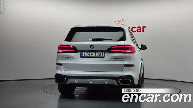 BMW X5 2021 — ფოტო 16/20