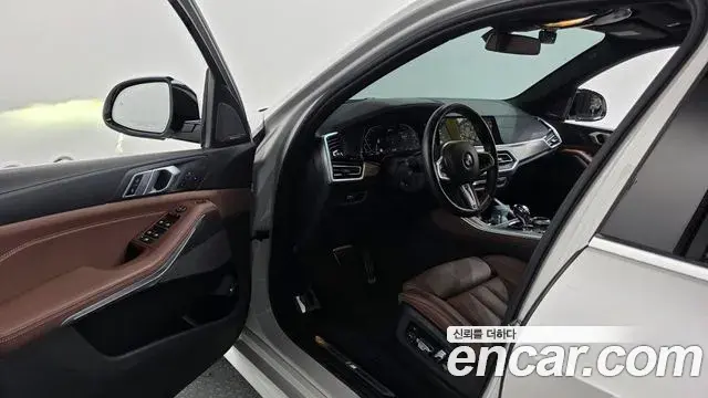 BMW X5 2021 — ფოტო 4/20