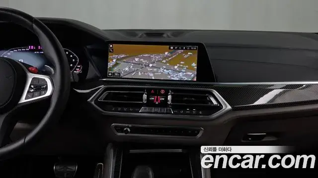 BMW X5M 2021 — ფოტო 28/33