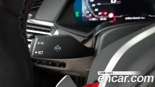 BMW X5M 2021 — ფოტო 4/33