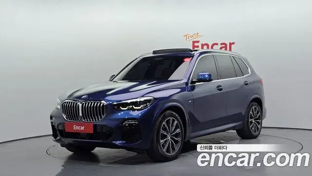 BMW X5 2020 — Фото 1/20