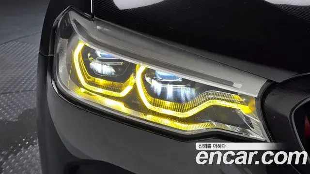 BMW M5 2018 — ფოტო 18/32