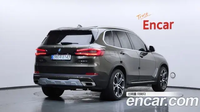 BMW X5 2023 — Фото 2/20
