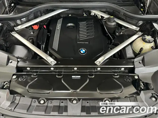 BMW X7 2021 — ფოტო 14/20