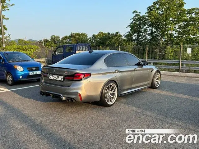 BMW M5 2020 — ფოტო 13/20