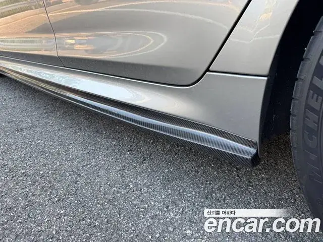 BMW M5 2020 — ფოტო 8/20