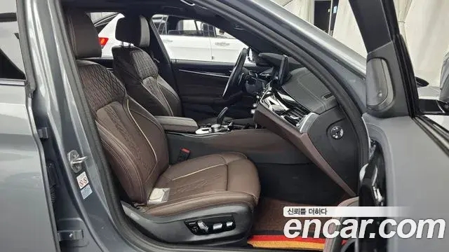 BMW 5 Series 2023 — ფოტო 4/35