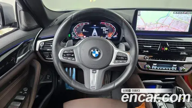 BMW 5 Series 2023 — ფოტო 34/35