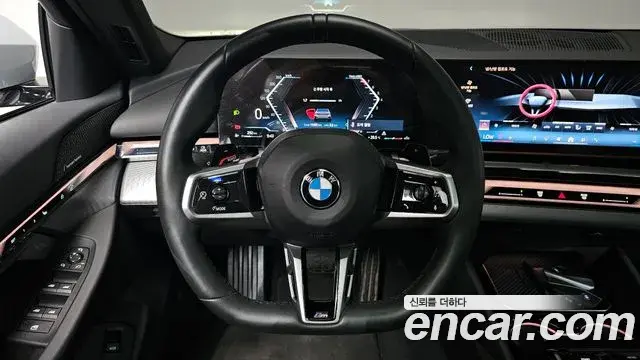 BMW 5 Series 2024 — ფოტო 23/36