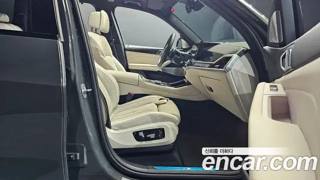 BMW X5 2024 — ფოტო 28/35