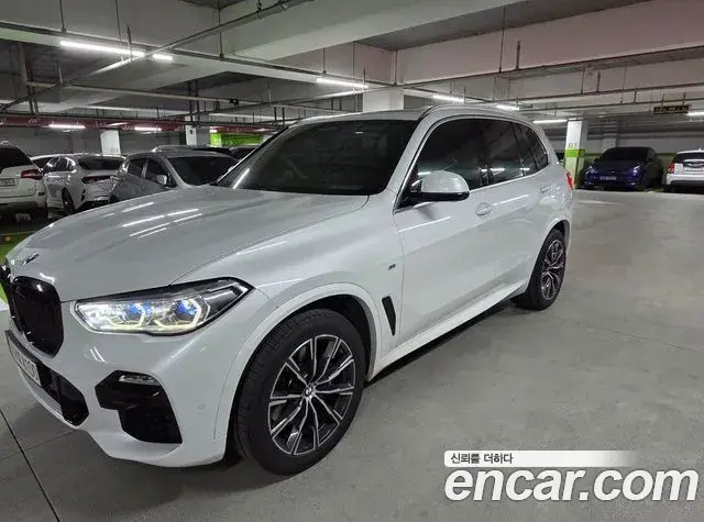 BMW X5 2021 — Фото 1/5