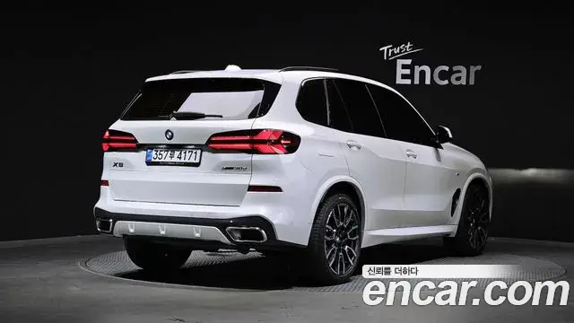 BMW X5 2025 — Фото 1/20