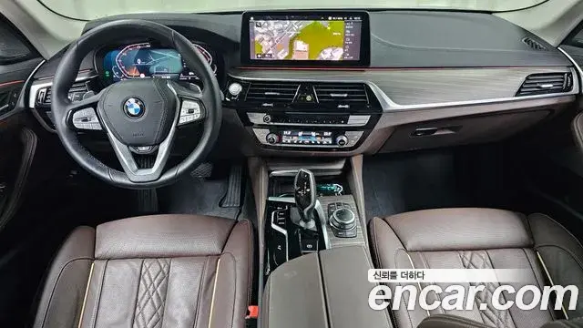 BMW 5 Series 2022 — Фото 10/20