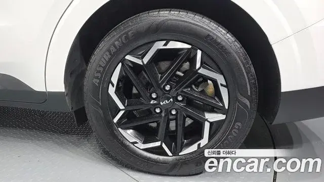 Kia Carnival 2024 — ფოტო 16/30