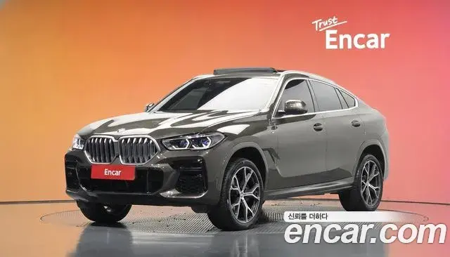 BMW X6 2022 — Фото 1/20