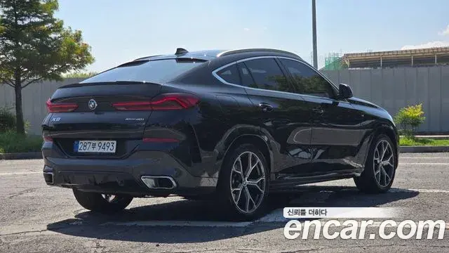 BMW X6 2023 — Фото 1/20