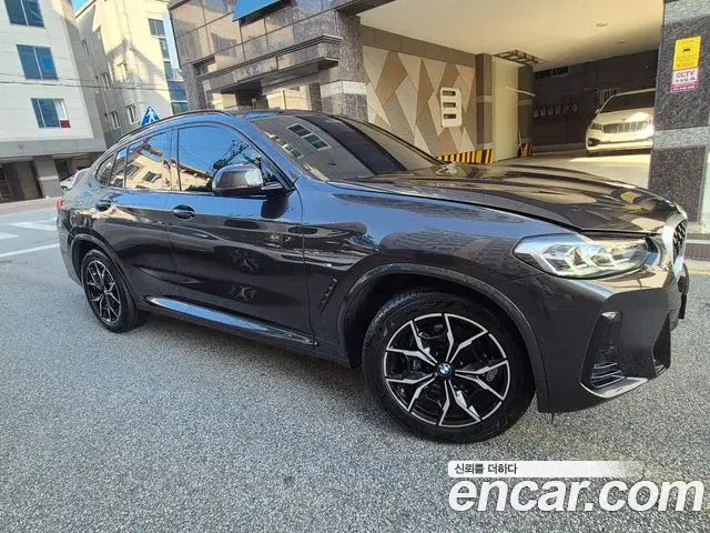 BMW X4 2024 — Фото 1/20