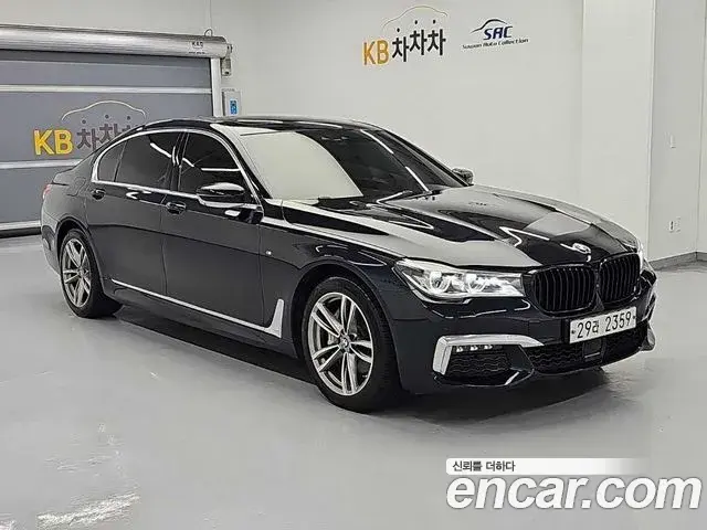 BMW 7 Series 2018 — Фото 1/20
