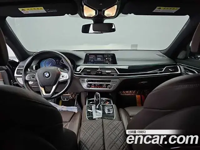 BMW 7 Series 2018 — Фото 6/20