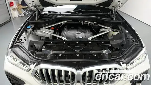 BMW X6 2023 — ფოტო 18/20