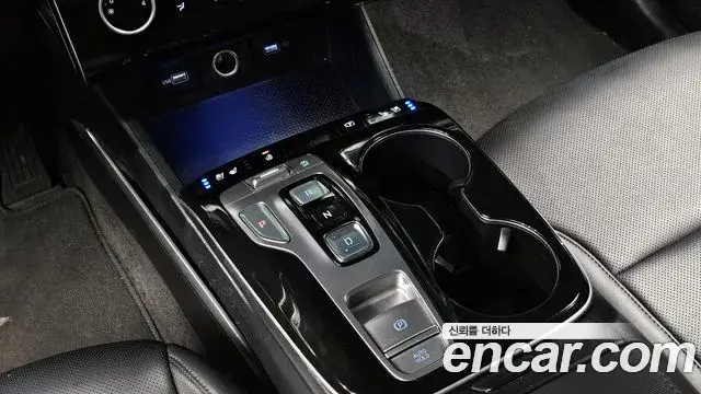 Hyundai Tucson Hybrid 2021 — ფოტო 9/20