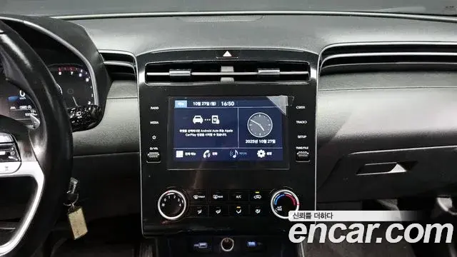 Hyundai Tucson Hybrid 2021 — ფოტო 7/20