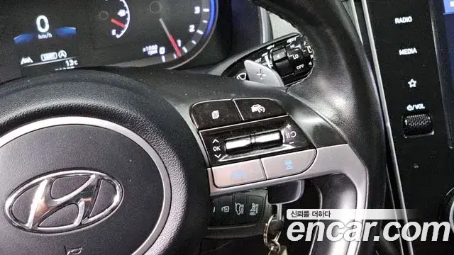 Hyundai Tucson Hybrid 2021 — ფოტო 4/20