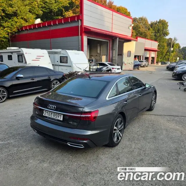 Audi A6 2021 — ფოტო 2/18