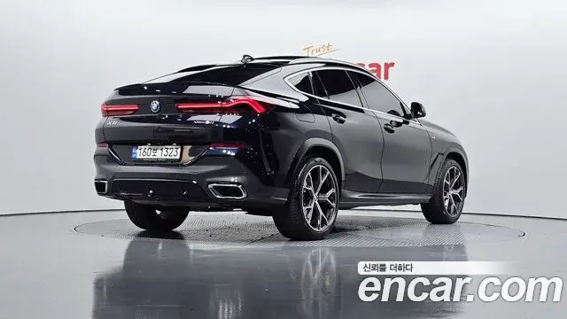 BMW X6 2022 — Фото 2/20