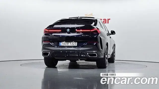 BMW X6 2022 — Фото 4/20