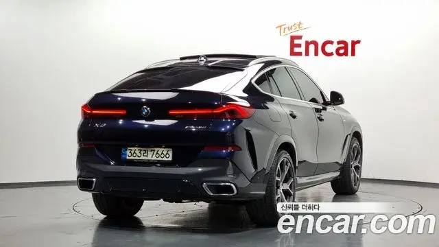 BMW X6 2021 — Фото 2/20