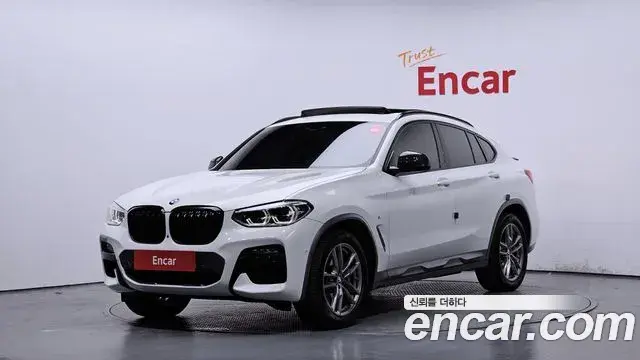 BMW X4 2021 — Фото 1/20